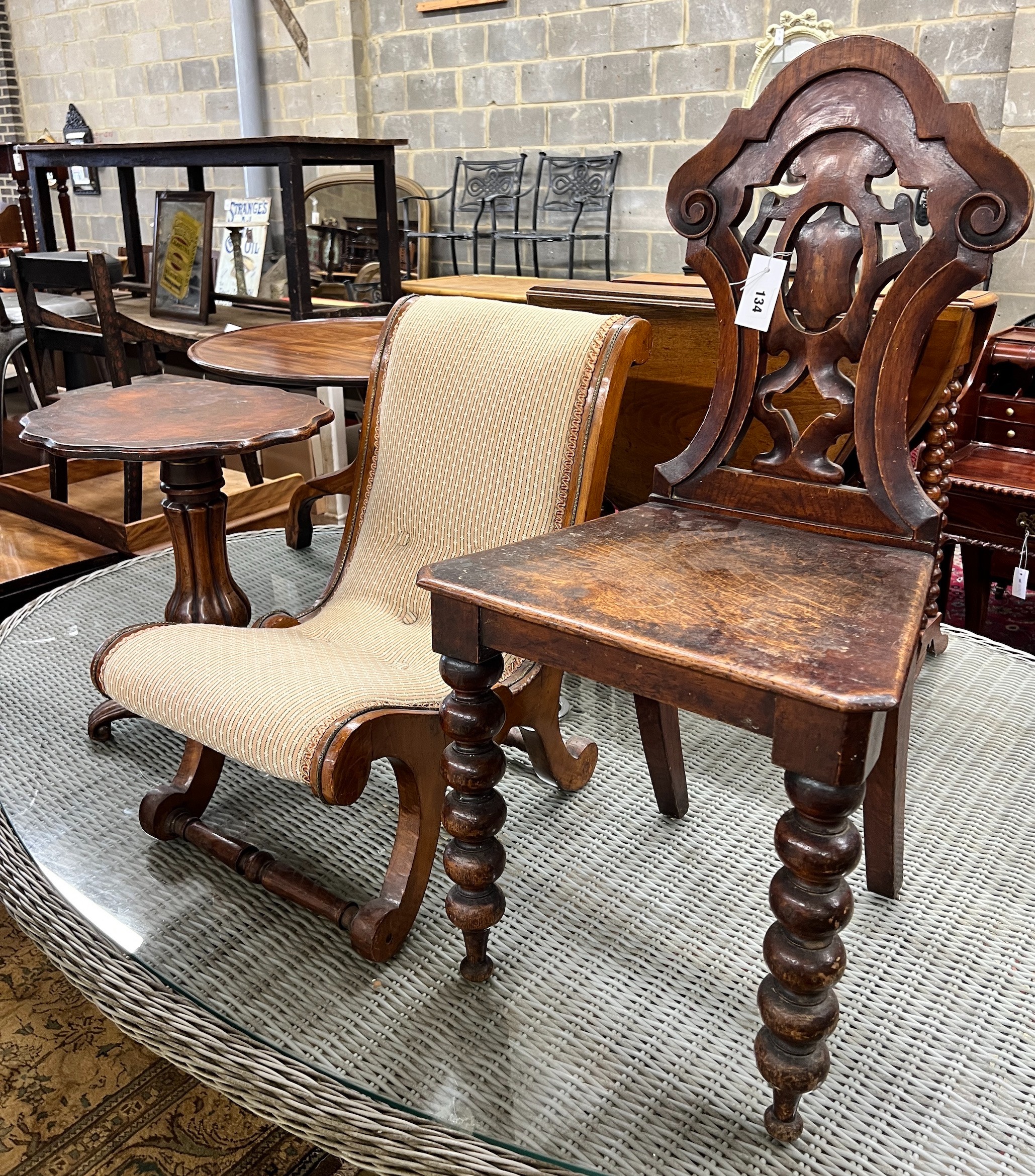 A Victorian oak and mahogany hall chair, a slipper chair and a wine table